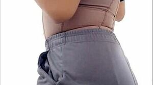 Latina milf cleaner flashes big tits in bathroom for porno.