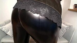 fetish leather camgirl nina performs a seductive striptease