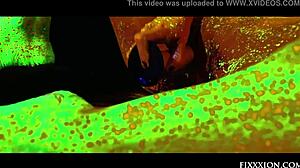 i'm the glow in the dark goddess fingering my shaved pussy with dildo solo.