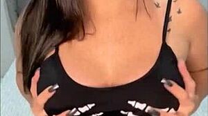 Brunette woman likes to exhibit and place objects