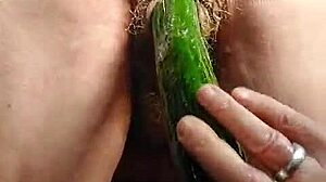 old granny bangs hairy slit with cucumber