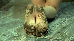 Foot fetish fans, check dirty feet in bugs bunny pose getting hit with a ruler.