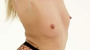 blonde relaxes in stockings and fishnets, shaved pussy