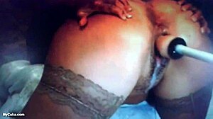 Milf with big ass squirts during machine fucking.