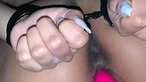 Gaping her ass with toys.