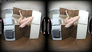 Solo girl Sara Bork has fun in the kitchen and pleases herself while her big tits are being touched in VR.
