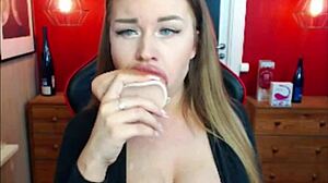 Have You Seen This Busty Blue-Eyed Babe Deepthroating a Dildo?