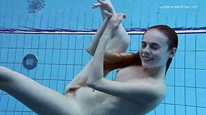 anna netrebko’s small tits shine in striped swimsuit