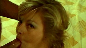 beautiful blonde milf gives blowjob and takes facial cum