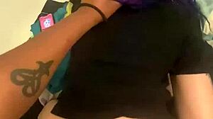 In a casual bedroom scene, the tatted dreadhead goth Latina bends over in knee high socks. She gets fucked doggystyle to squirting orgasm while talking dirty.