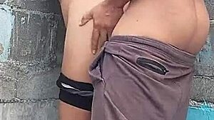 Leaning against the wall with my brunette neighbor