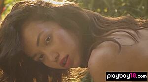 Petite Filipina Kit Rysha teases outdoors. Her sensual striptease captivates every onlooker.