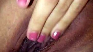 Latina fingers her clit hard