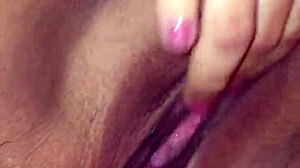 Latina fingers her clit hard