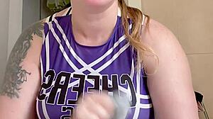 submissive listens to femdom's humiliating dirty talk in fetish scene.