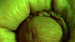 Detailed scene of a gay man masturbating to orgasm and cumming hard