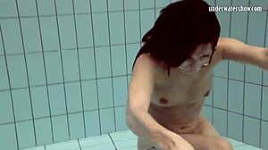 Loris Licicia shows off her petite figure in a hot underwater naked swim