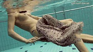 Loris Licicia shows off her petite figure in a hot underwater naked swim