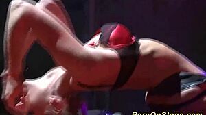 this hot babe does a striptease on the public stage, clothes ripping off