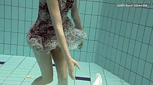 Loris Licicia shows off her petite figure in a hot underwater naked swim