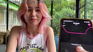 Skinny cutie walks city streets with vibrator buzzing inside!