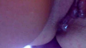 In the bedroom, she masturbates her shaved pussy with toys until a cumshot