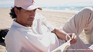 Boy Reads on Beach Until She Surprises Him