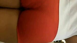 Hot girl in tight shorts at market