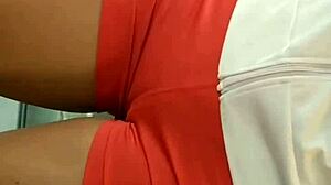 Hot girl in tight shorts at market