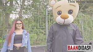 The horny redhead takes MILKY BEAR to FUCK in the studio