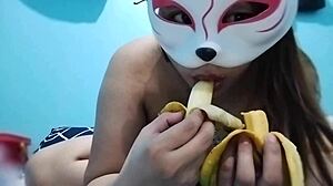 Busty asian babe masturbates with banana