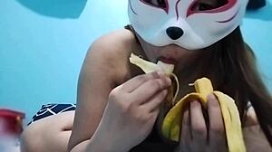 Busty asian babe masturbates with banana