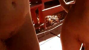 Amateur teens masturbate outdoors at party. They finger each other intensely.