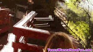 Amateur teens masturbate outdoors at party. They finger each other intensely.