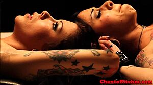 Mistress dominates her submissives in a lesbian bdsm session