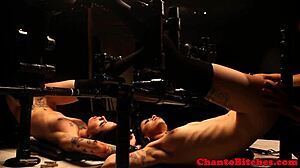 Mistress dominates her submissives in a lesbian bdsm session