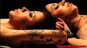 Mistress dominates her submissives in a lesbian bdsm session