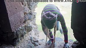 Does this tattooed girl with pierced pussy get anal outdoors?