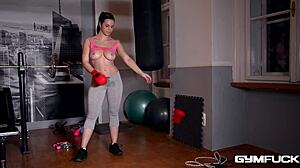 athletic brunette milf nekane contrasts gym workout with intense fingering masturbation in big tits vid