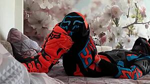 Motocross Rider In Costume Treads Boots In Gay Scene