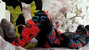 Motocross Rider In Costume Treads Boots In Gay Scene