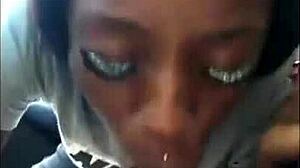 The ebony chick feels intense pleasure sucking the white dick, getting sloppy and wet.