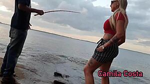 Searching for a campsite, met a fisherman, grabbed his rod for a lesson.