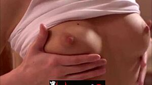 Young blonde beauty teasing with sensual moves and charm.