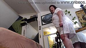 Vacuuming in Slippers with No Panties - Retro Redhead Tease. Watch Her Big Ass in Action!