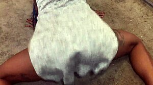 the girl twerks under her skirt, showing panties in this upskirt video