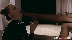 Latex-covered Rossy Bush feels intense submission to Mia Reese's strapon.