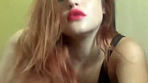 Horny redhead teen RitaFox dances sexy in heels and clothes, showing tits, pussy, and ass in fetish reality.