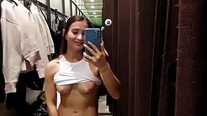 sexy brunette neighbor risks orgasm in fitting room