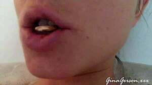 young blonde teen gives footjob in home video, stroking with pretty feet